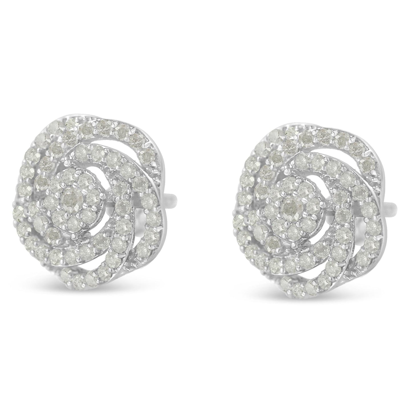 Pair of white metal round-shaped stud earrings with prong-set white gemstones arranged in a swirl pattern, shown from a front angle.