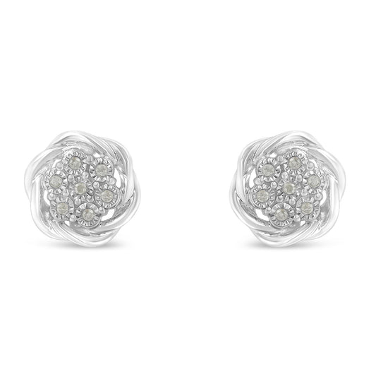 Front view of white metal stud earrings with round white gemstones in a miracle setting, arranged in a floral cluster.