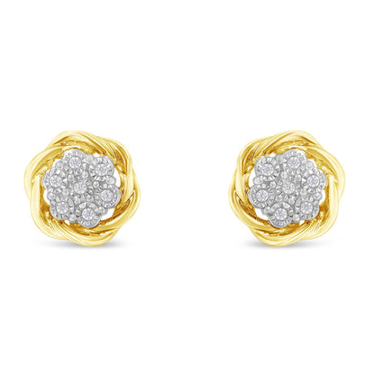 Front view of a pair of yellow metal earrings with clusters of round white gemstones in miracle settings at the center.