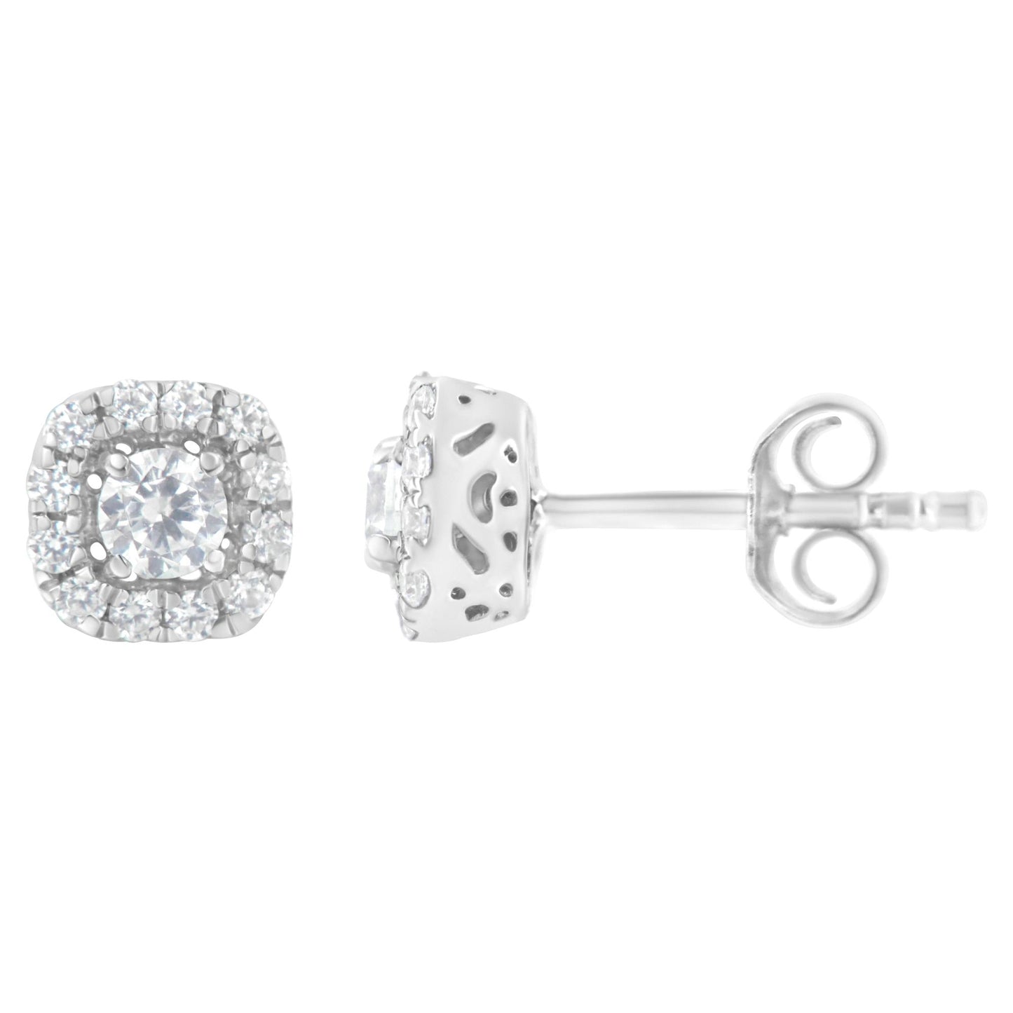 Front and side views of a pair of white metal earrings with a central round white gemstone in a 4-prong setting, surrounded by a halo of smaller round white gemstones in a pave setting.