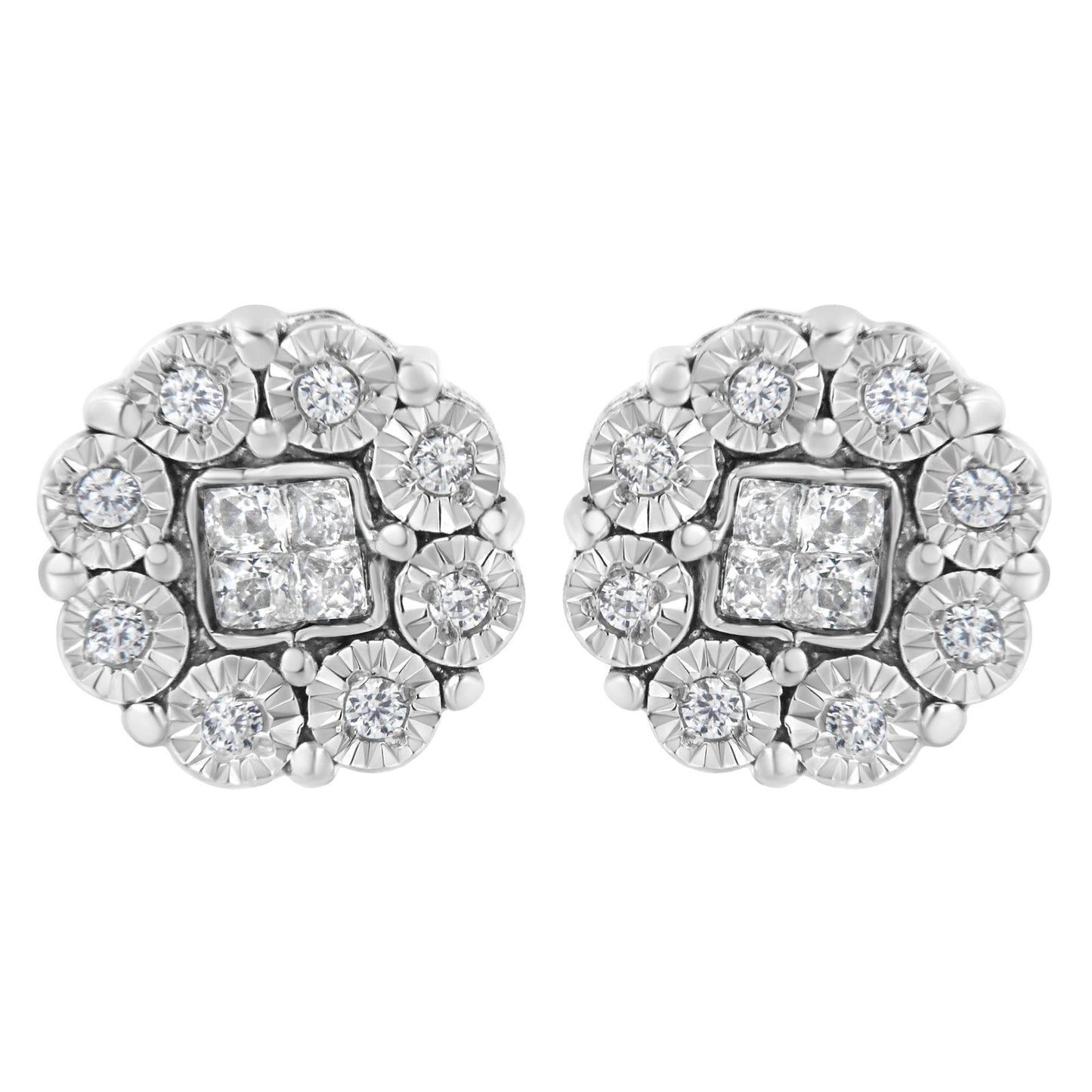 Close-up front view of a pair of white metal stud earrings featuring clusters of round white gemstones surrounded by square white gemstones in the center.