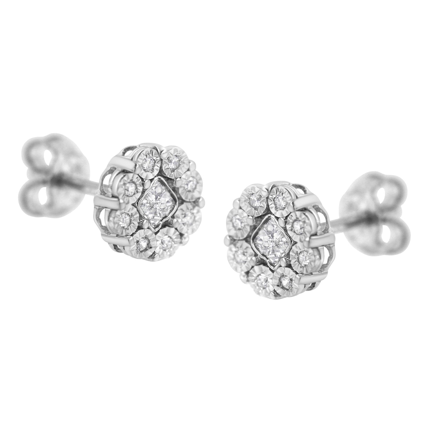 Pair of white metal stud earrings with round and princess shaped white gemstones set in a floral cluster, shown from a front angled view.