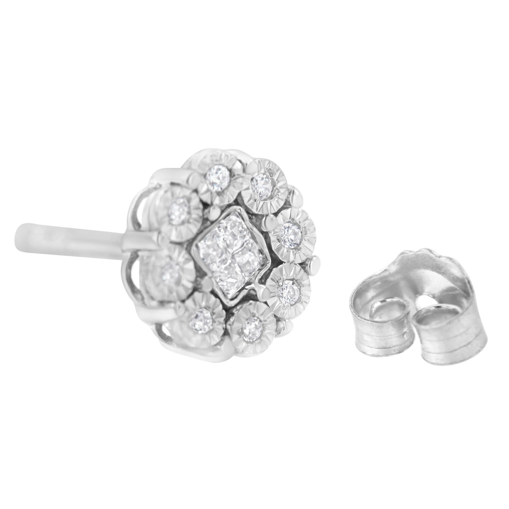 Close-up side angle of a white metal stud earring with a cluster of round and princess shaped white gemstones and a separate backing piece next to it.