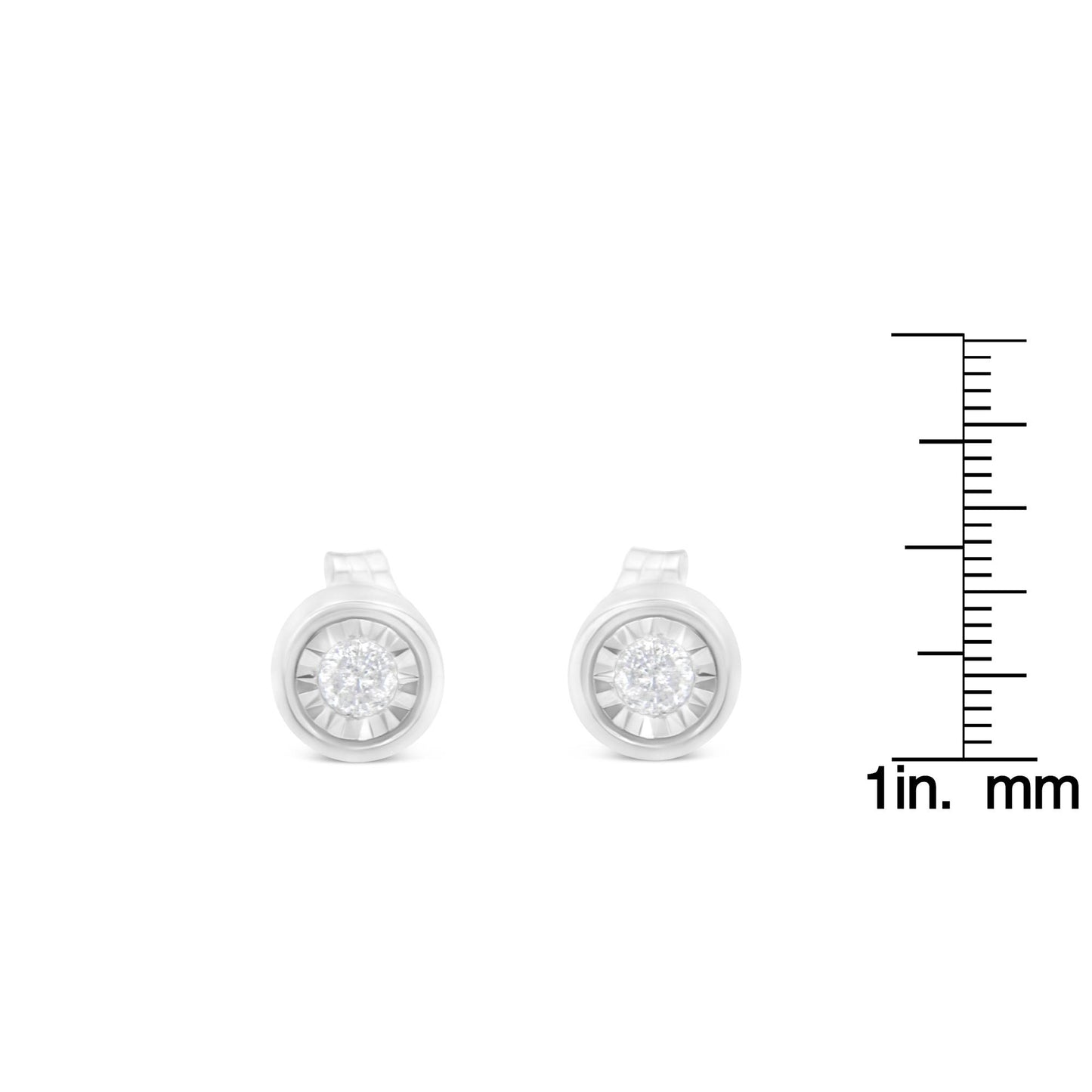 Front view of white metal round shaped stud earrings with white gemstones, shown beside a ruler for size reference.