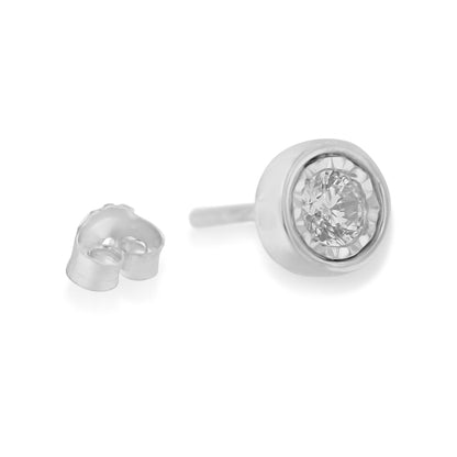 Close-up front angle of a single white metal stud earring with a round white gemstone in a miracle setting, alongside its butterfly backing.