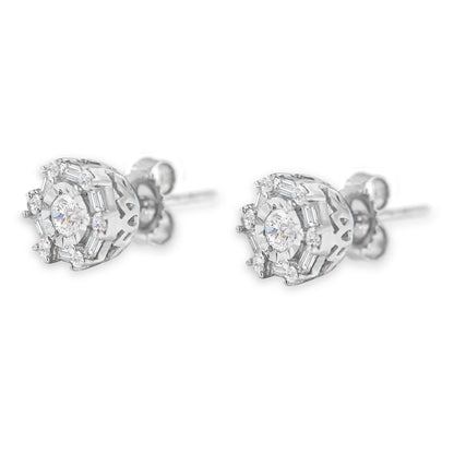 Pair of white metal stud earrings with round and baguette white gemstones in various settings, shown from a side angle.