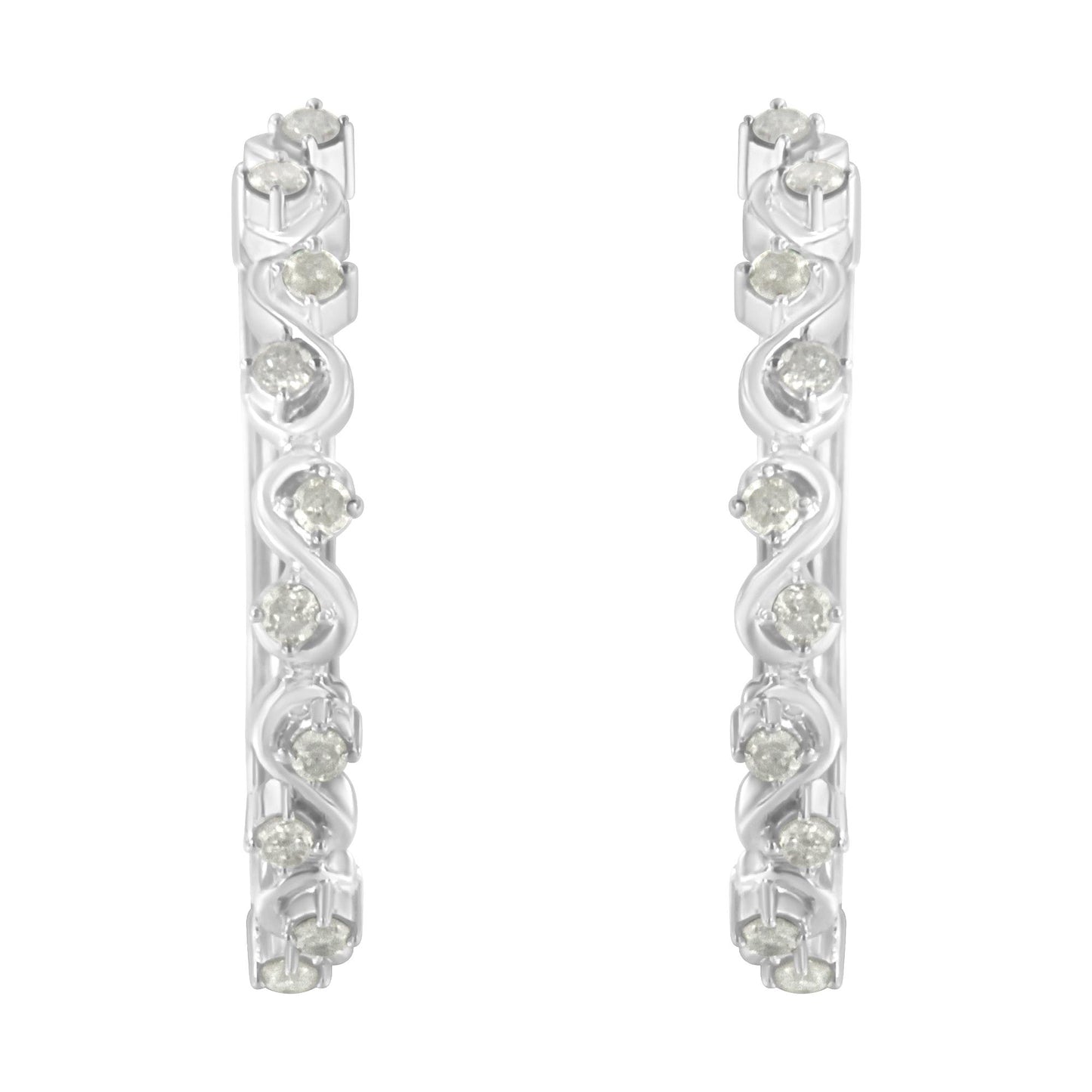 Front-facing close-up of white metal hoop earrings featuring round white gemstones in prong settings arranged in a swirl pattern.