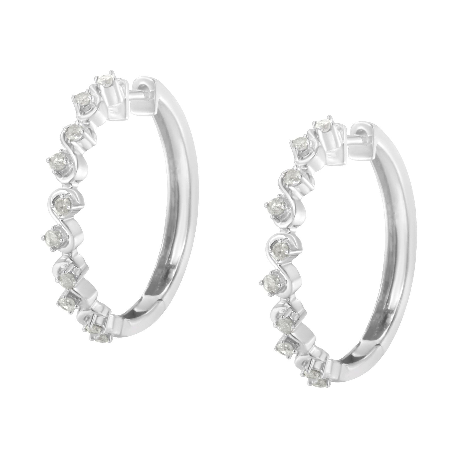 Pair of white metal hoop earrings with prong-set round white gemstones along the front, shown from a front angle on a white background.