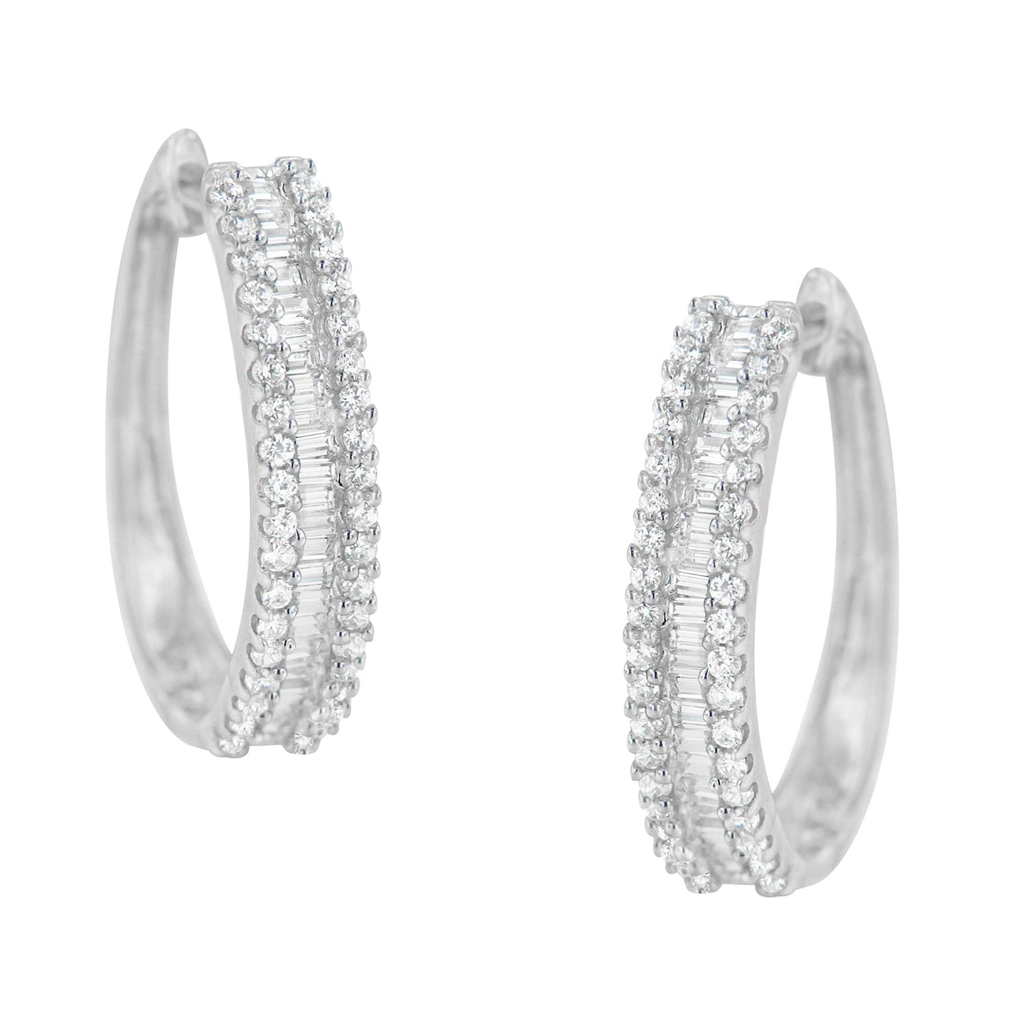 Front-facing pair of white metal hoop earrings with pave-set round white gemstones flanking channel-set baguette white gemstones along the outer curve.