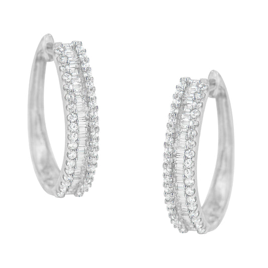 Front-facing pair of white metal hoop earrings with pave-set round white gemstones flanking channel-set baguette white gemstones along the outer curve.