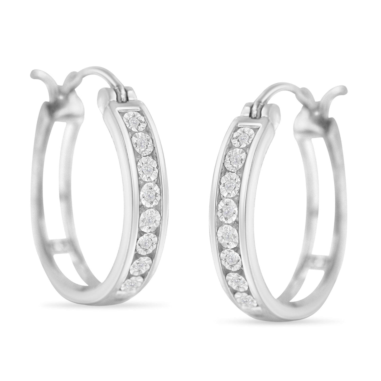 Pair of white hoop earrings with round white gemstones in a miracle setting, shown from a front angle.