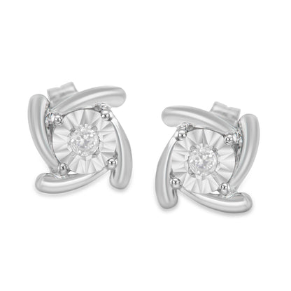 Pair of white metal stud earrings with round white gemstones in miracle settings, shown from front angle.