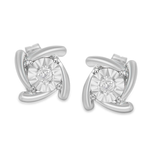 Pair of white metal stud earrings with round white gemstones in miracle settings, shown from front angle.