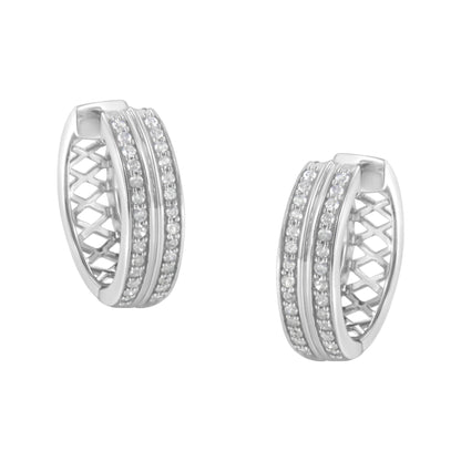 Pair of white metal hoop earrings with two rows of small white gemstones in pave setting, shown from an angled front view.