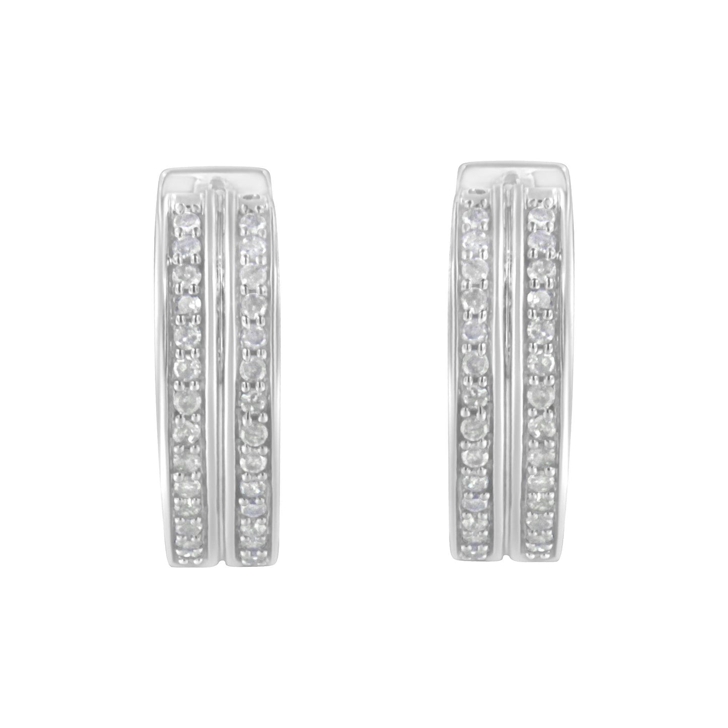 Front-facing shot of a pair of white metal earrings featuring two vertical rows of small round white gemstones set in pave style on each earring.