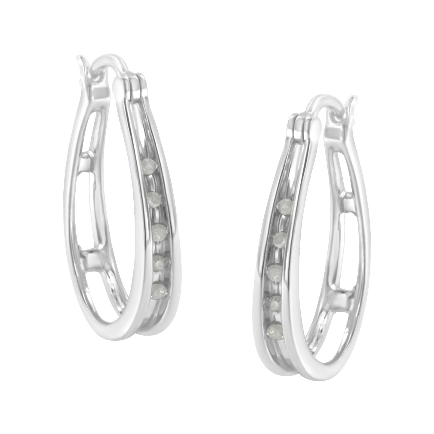 Pair of white metal hoop earrings with channel-set round white gemstones, shown at a three-quarter angle.