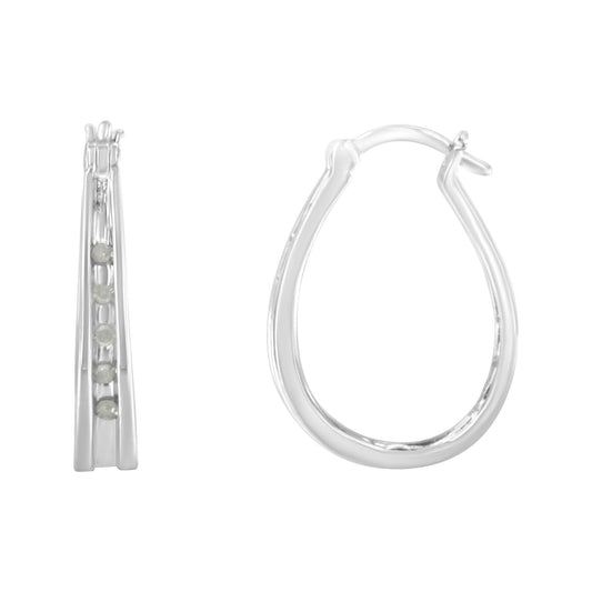 Front and side view of white metal hoop earrings with round white gemstones set in a channel setting, photographed on a white background.