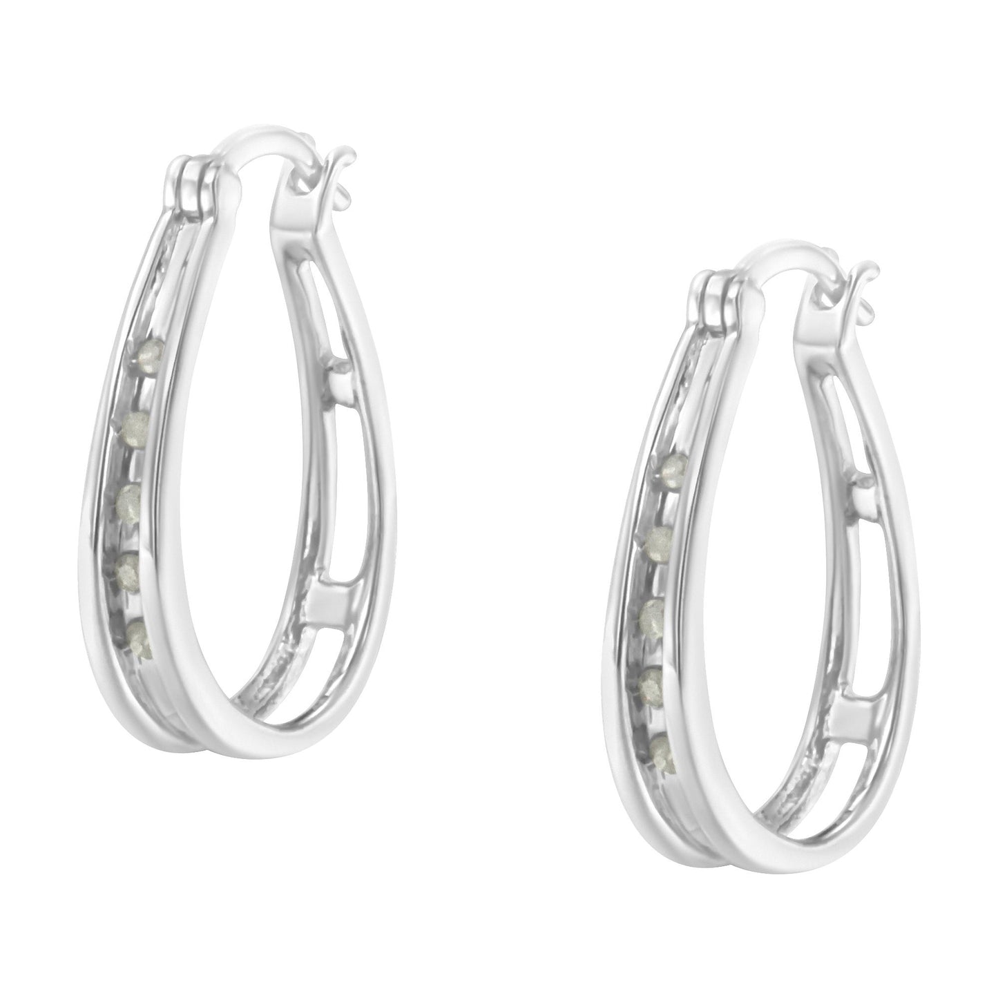 Pair of white metal earrings with an oval shape and channel-set round white gemstones, shown from a front angle.