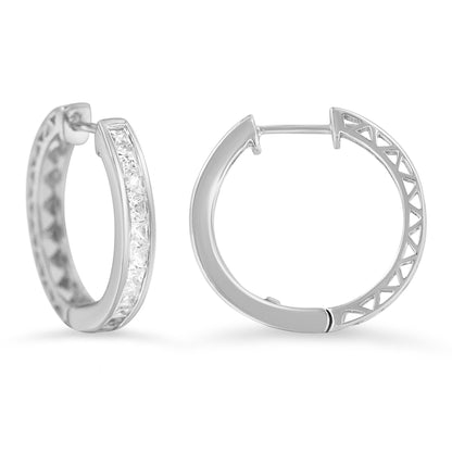 Pair of white metal hoop earrings shown from front and back angles, featuring a channel setting of white princess-shaped gemstones on the front.