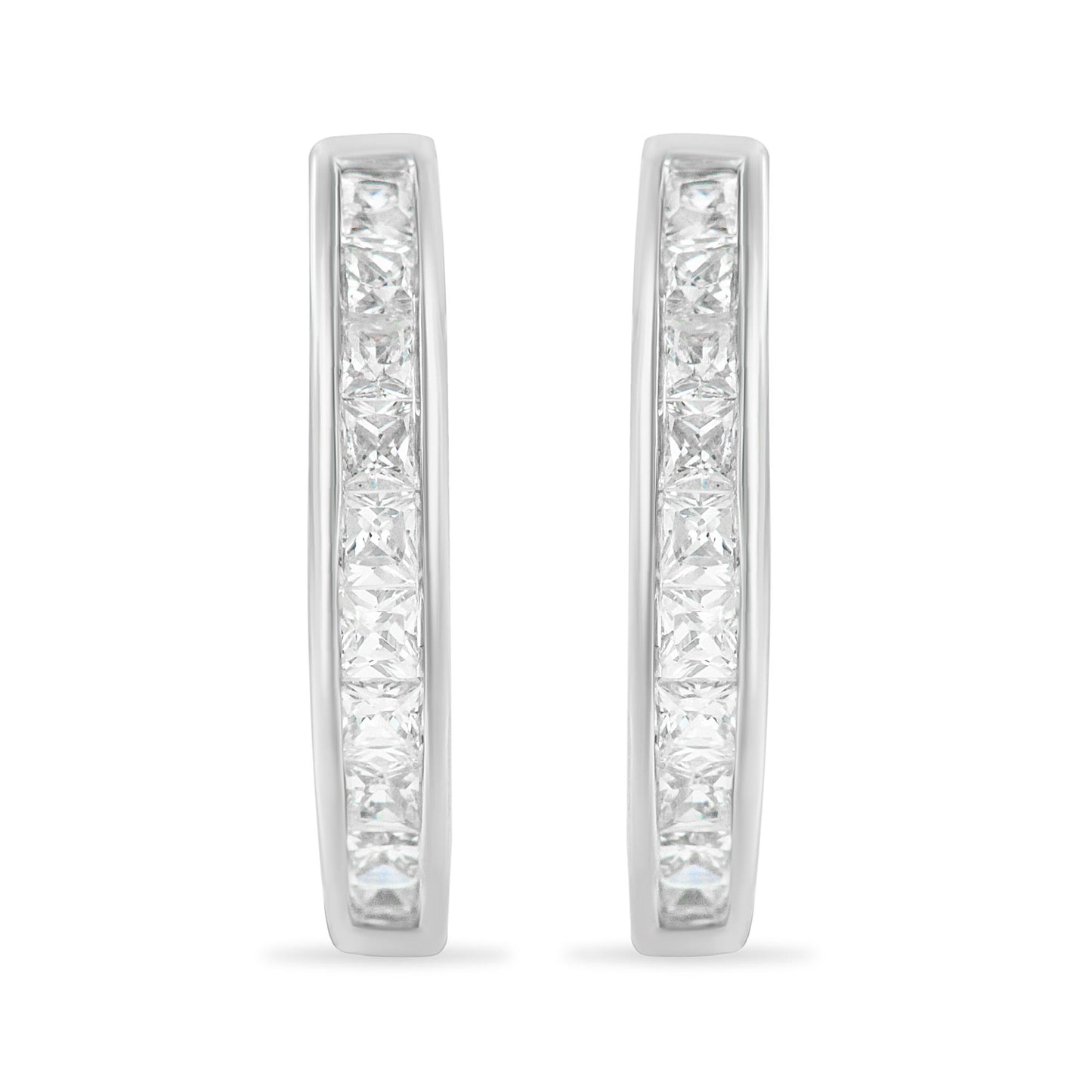 Front-facing view of white metal hoop earrings set with two rows of princess-shaped white channel-set gemstones.