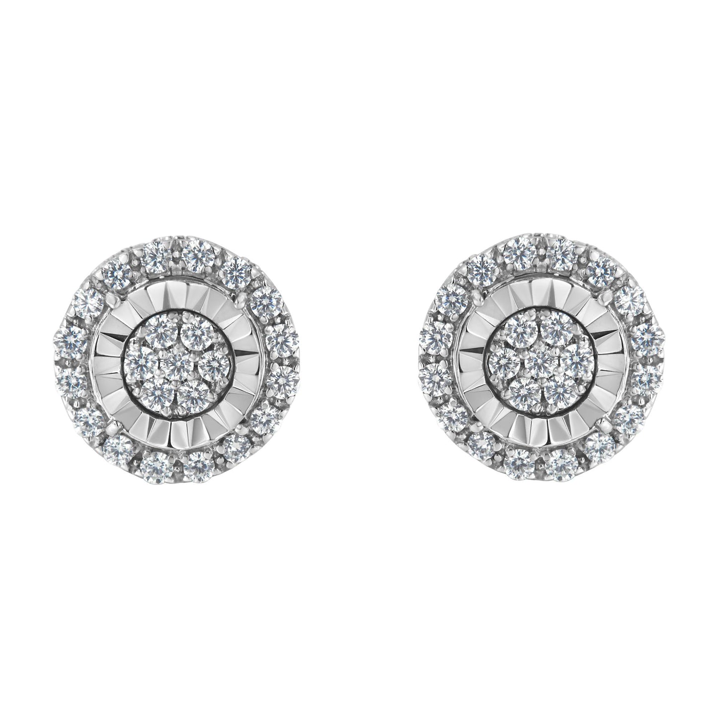 Front angle view of a pair of round white metal earrings with concentric circles of prong-set white gemstones.