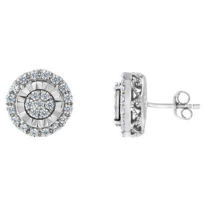 Pair of white metal round stud earrings with white gemstones in prong setting, shown from front and side angles.