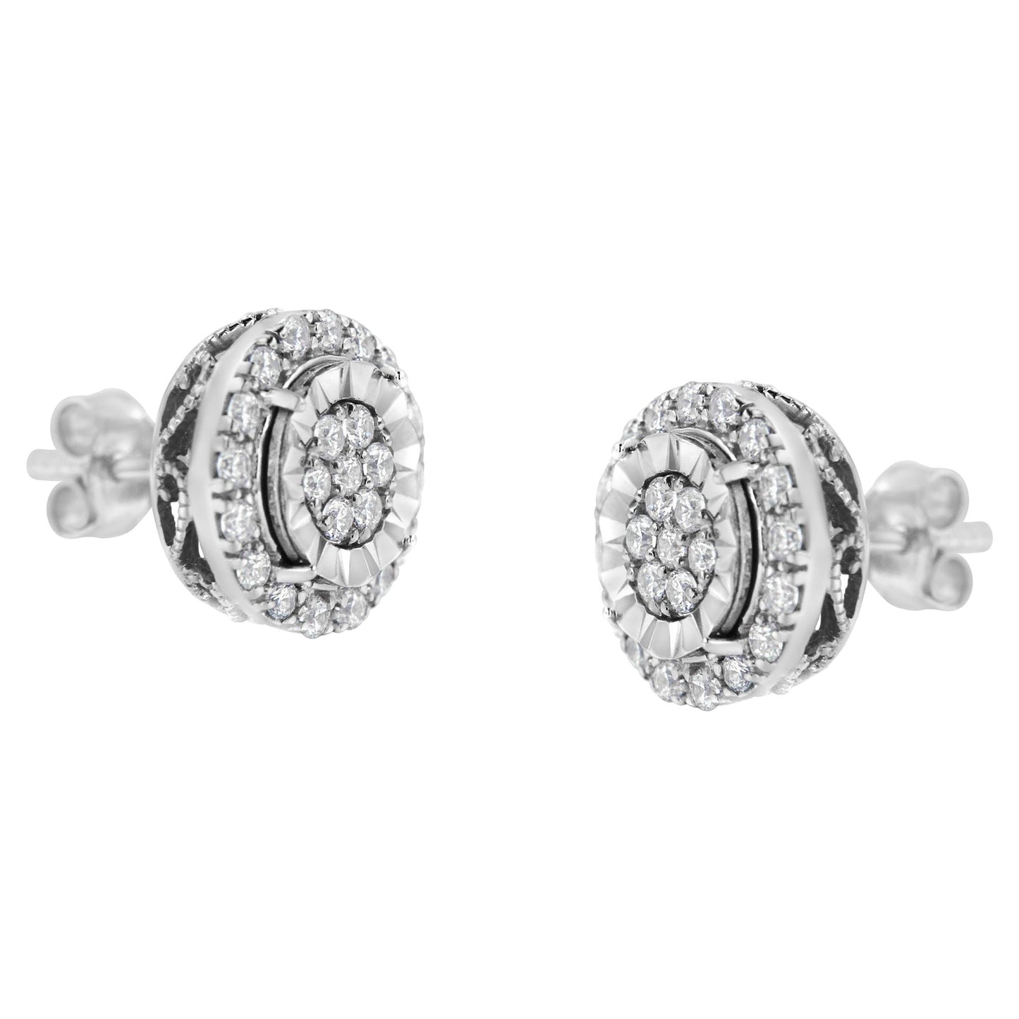 Pair of white metal stud earrings with round white gemstones in prong settings, shown from a front angled view.