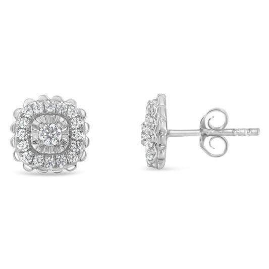 Pair of white metal stud earrings with round white gemstones in miracle and prong settings, shown from front and side angles.