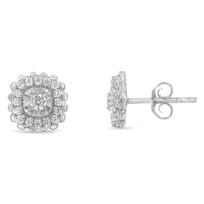 Pair of white metal stud earrings with round white gemstones in miracle and prong settings, shown from front and side angles.