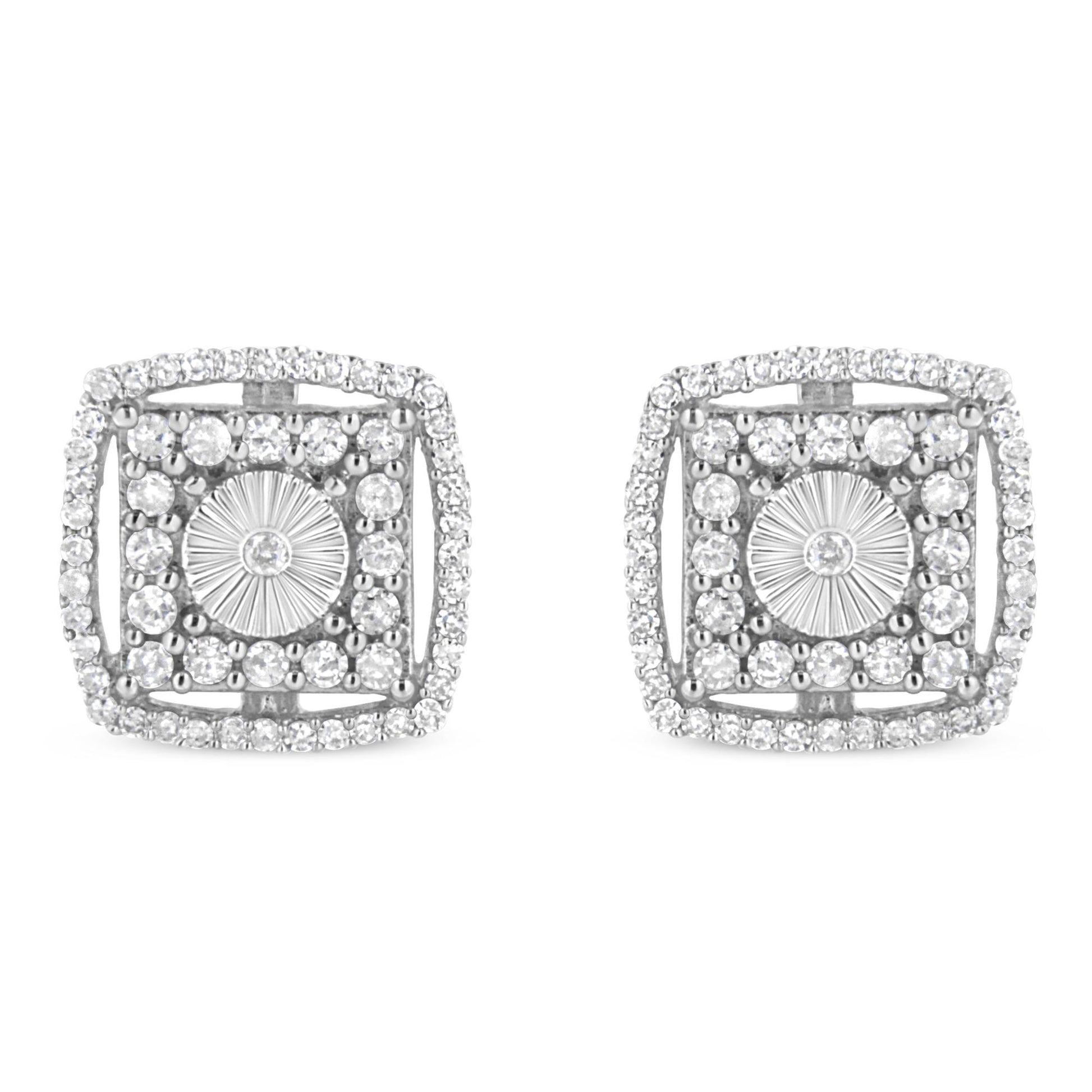 Pair of white metal square-shaped earrings with round bezel-set white gemstones in the center, surrounded by multiple round shared-prong-set white gemstones, shown from the front angle.