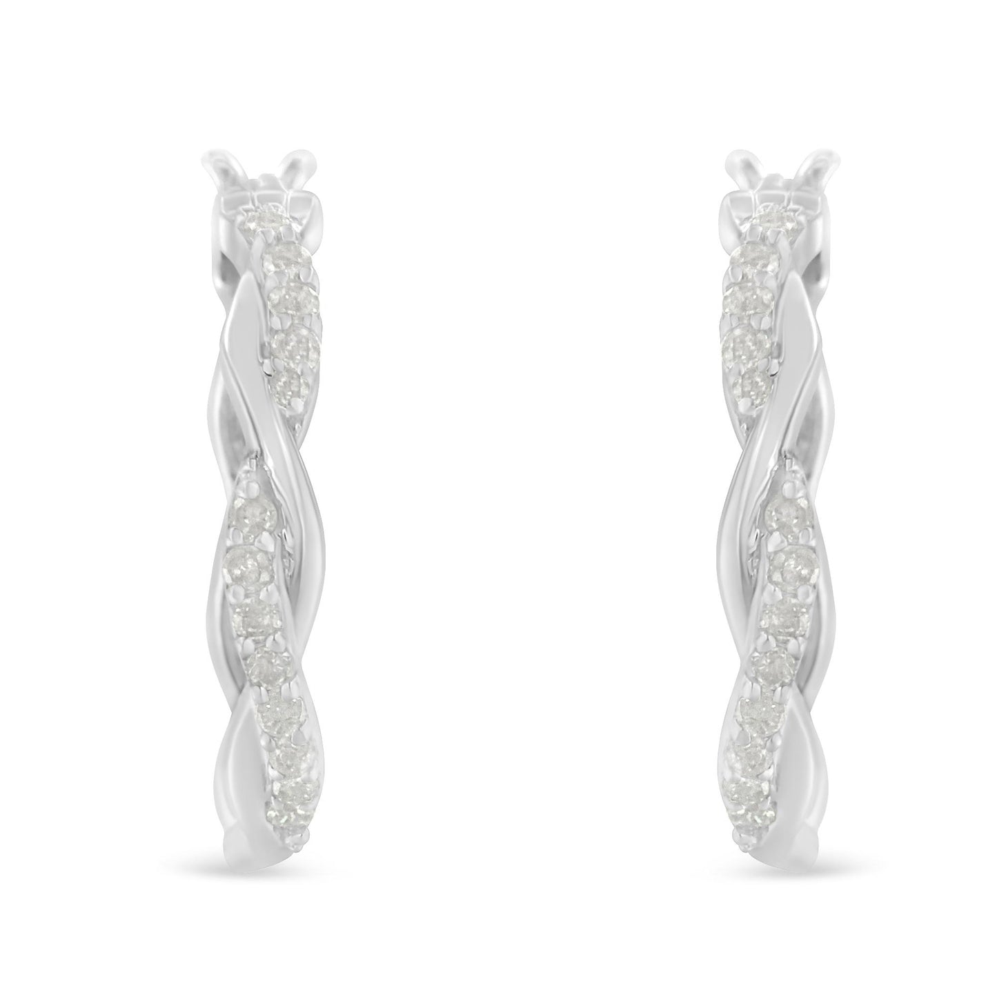 Front-facing close-up of white metal twisted hoop earrings with a row of round white gemstones in a pave setting.