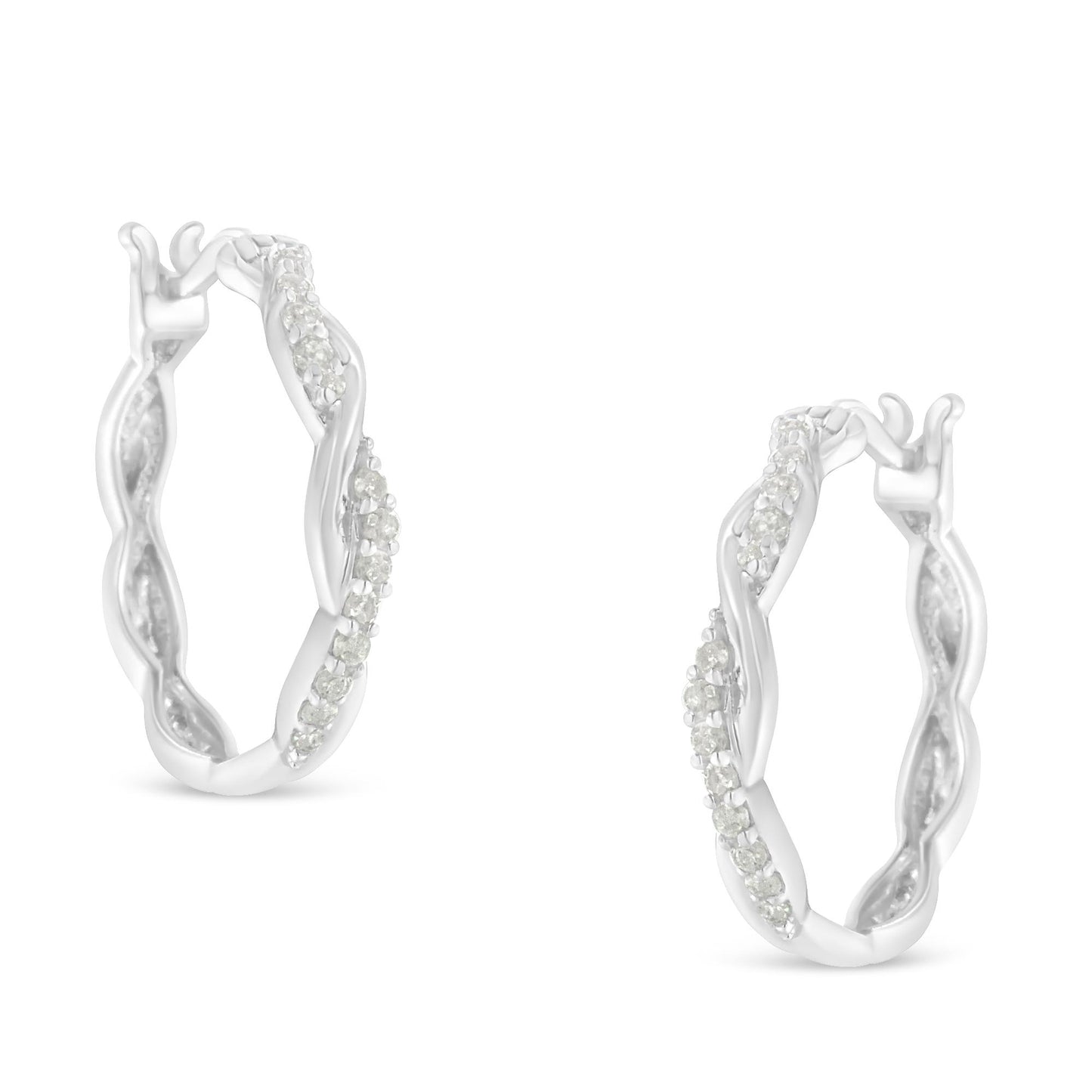 Pair of white metal hoop earrings with twisted design and round white gemstones in pave setting, front angle view.