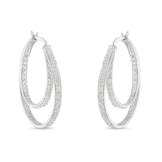 Pair of white metal hoop earrings with two rows of round white gemstones in pave setting, shown from a front angle.