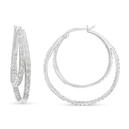 Pair of white metal hoop earrings with round white gemstones in pave setting, shown from front and side angles.