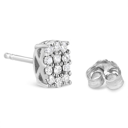 Close-up side angle of a white metal stud earring with multiple round white gemstones in prong setting, shown with its backing next to it.