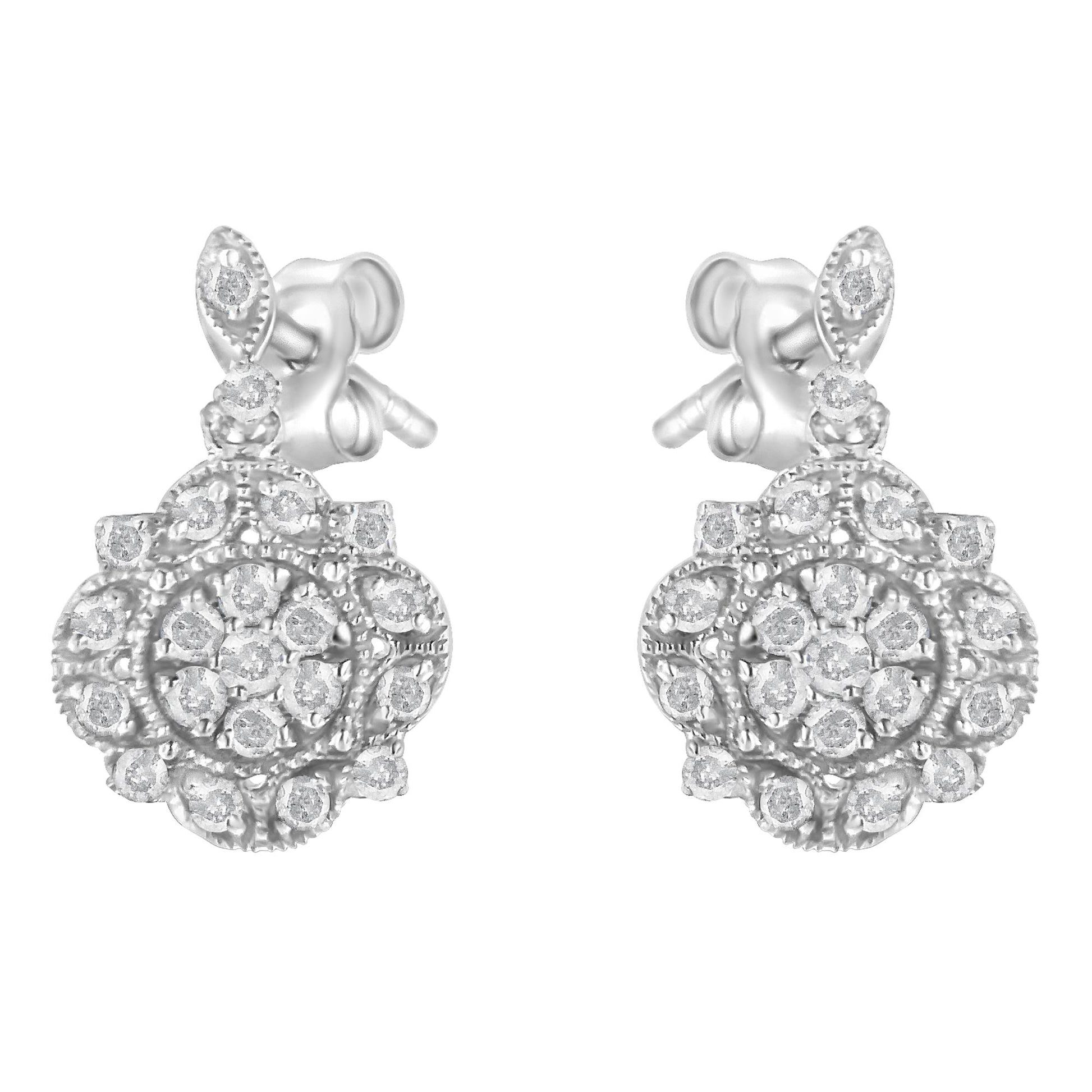 Front-facing view of a pair of white metal stud earrings with round white gemstones in prong settings arranged in floral cluster patterns.