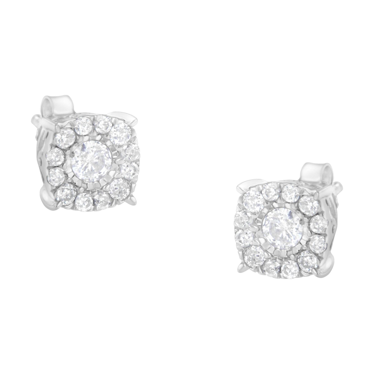 Pair of white metal stud earrings with round white gemstones in a pave setting, shown from a front angle.