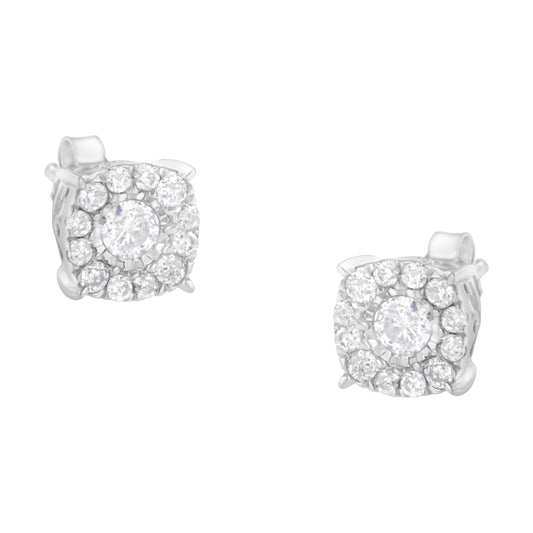 Pair of white metal stud earrings with round white gemstones in a pave setting, shown from a front angle.
