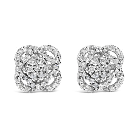 Front view of a pair of white metal stud earrings featuring multiple round white gemstones in prong settings arranged in a floral pattern.
