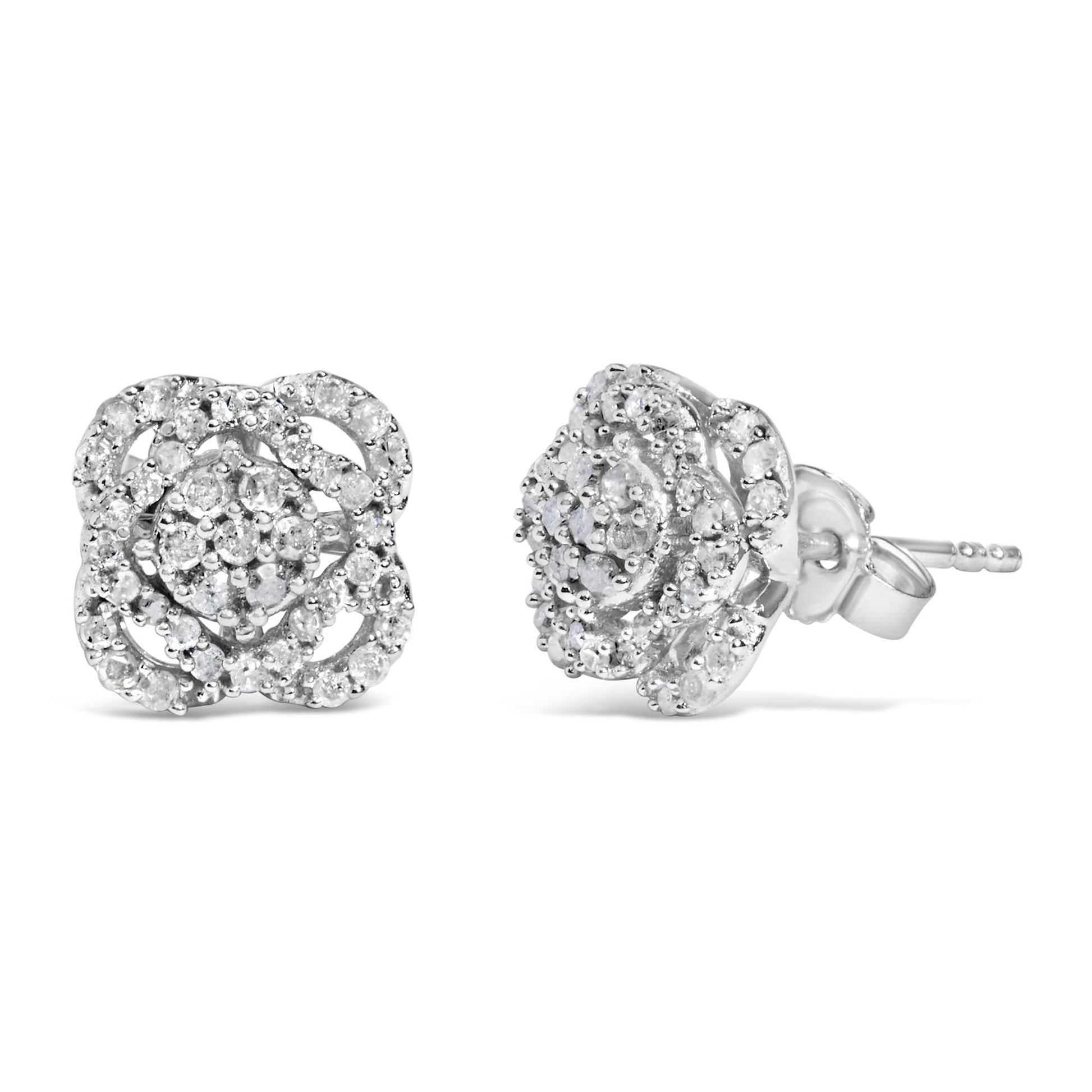 Pair of white metal earrings with round white gemstones set in a prong setting, shown from front and side angles.