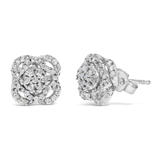 Pair of white metal earrings with round white gemstones set in a prong setting, shown from front and side angles.