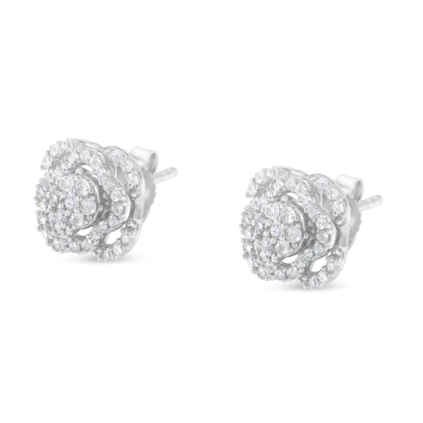 Pair of white metal stud earrings with round white gemstones in a floral cluster design, shown from a front angle.