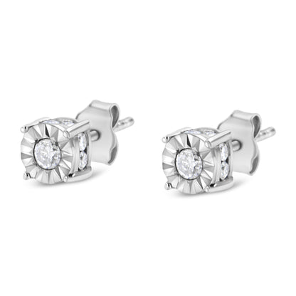 Front view of 1/2 cttw miracle-set diamond stud earrings showcasing center and channel-set diamonds on white background