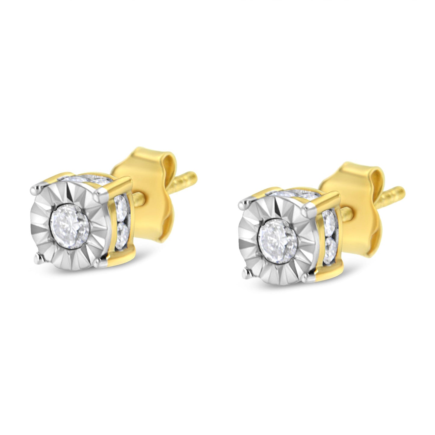 Pair of yellow metal stud earrings with round white gemstones in miracle and channel settings, shown from a front side angle.