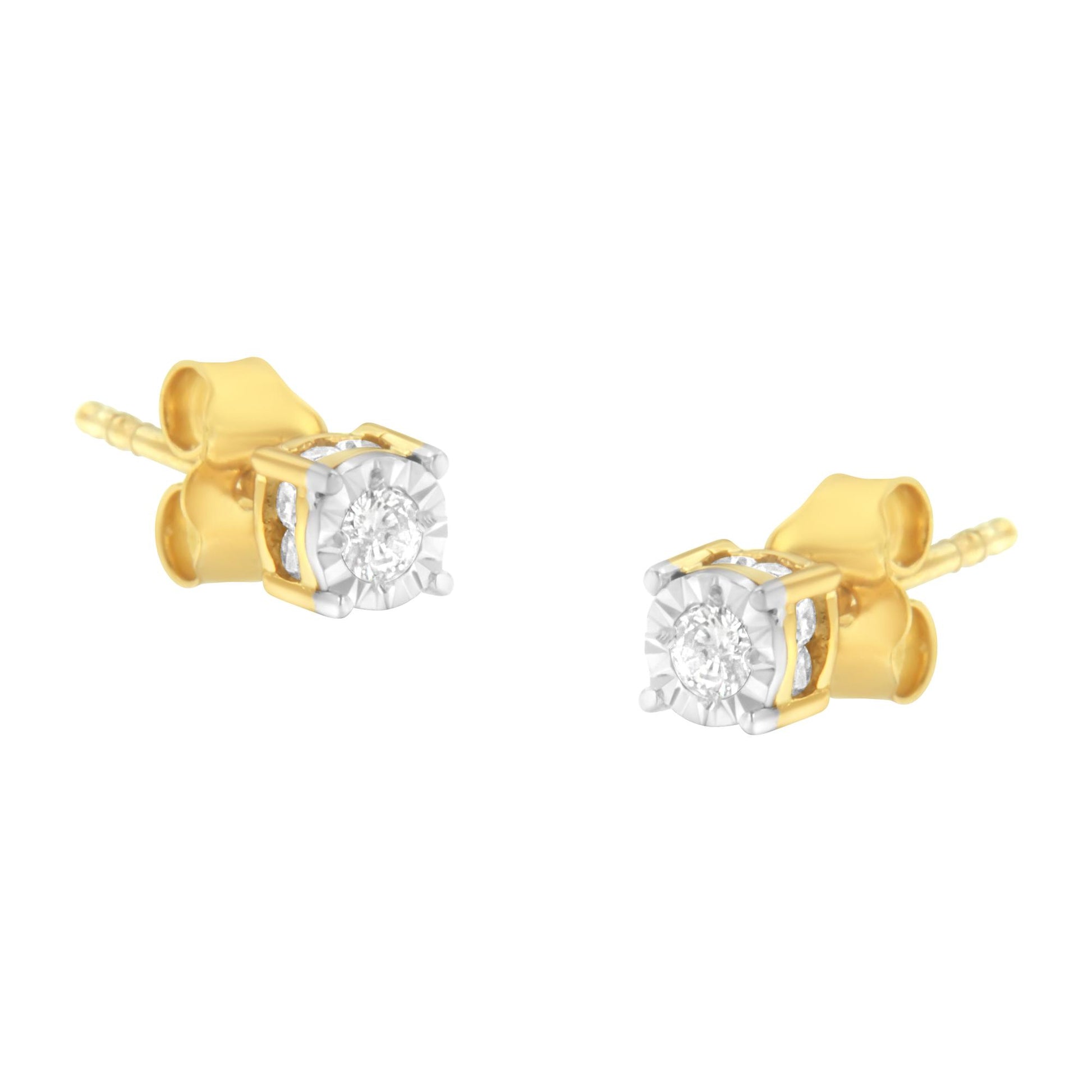 Close-up angle of a pair of yellow metal stud earrings with round white gemstones set in a miracle setting.