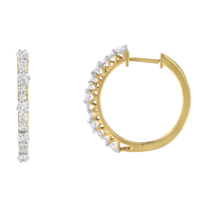 Front and side views of a yellow metal hoop earring with round white gemstones in prong settings along the outer edge, shown against a white background.