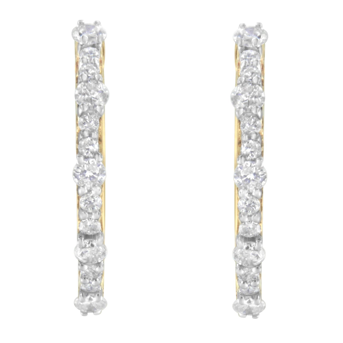 Front-facing view of yellow metal hoop earrings set with round white gemstones in prong settings.