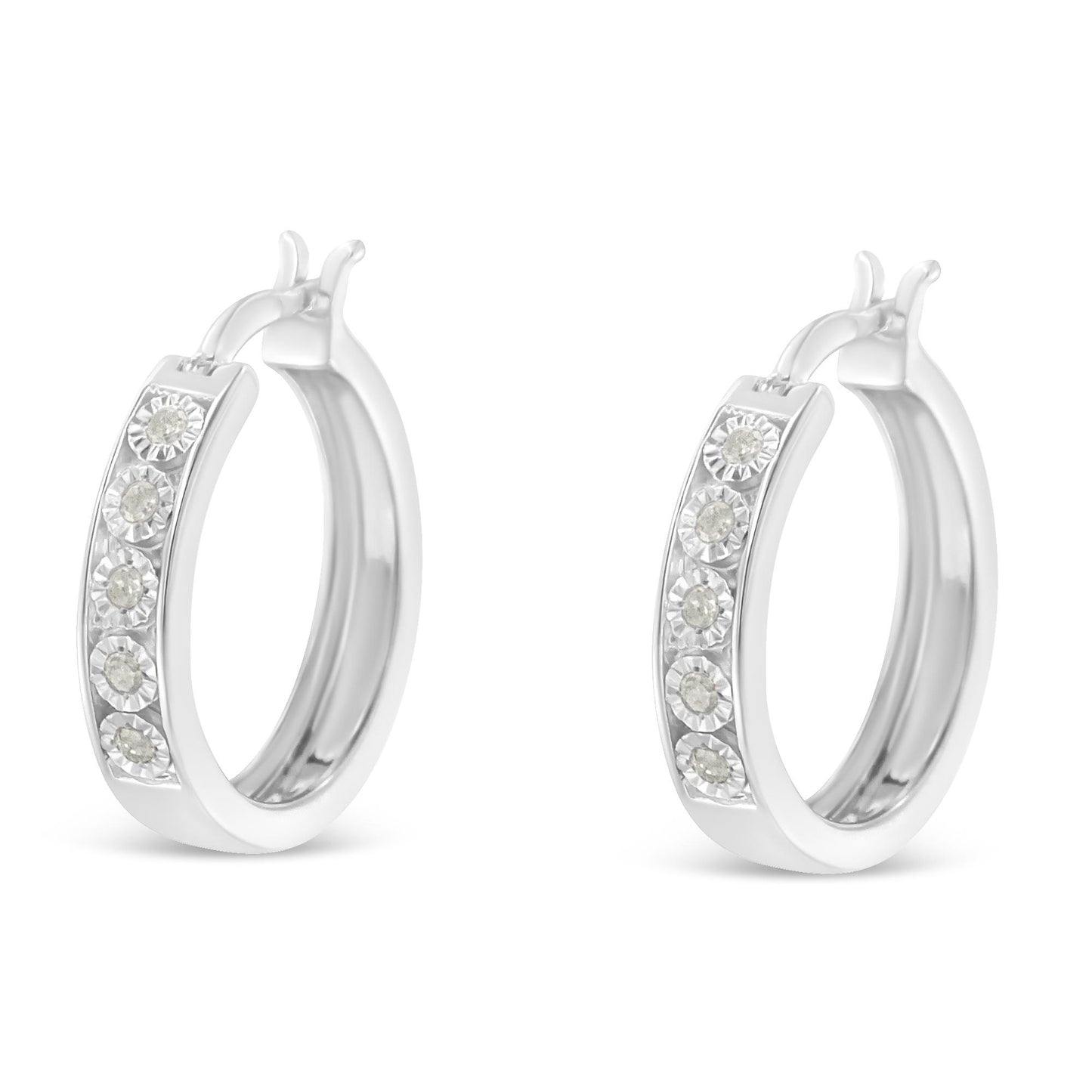 Pair of white hoop earrings with round white gemstones set in a row along the front, shown in a front angle view.