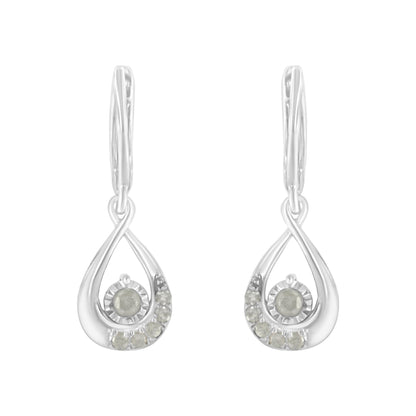 Front view of a pair of white metal drop earrings with round white gemstones in pave setting.