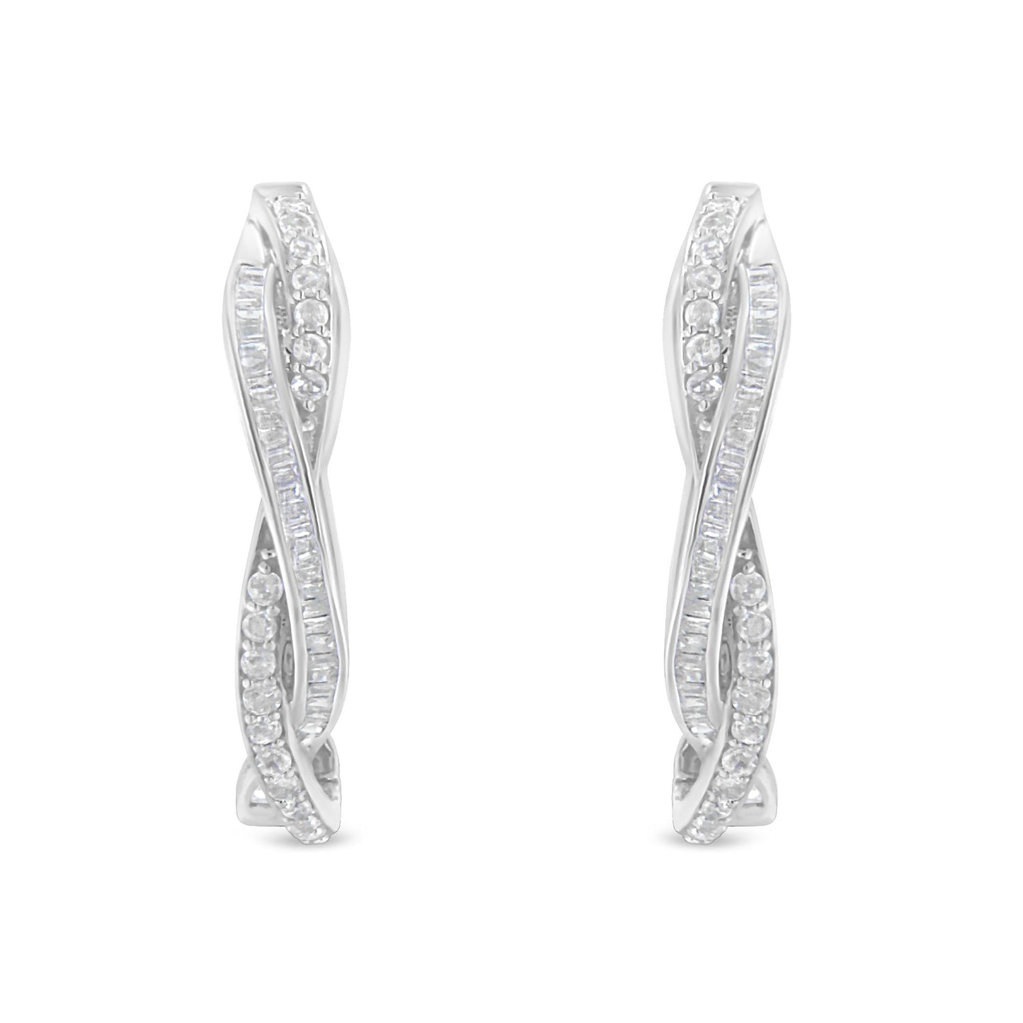 Front-facing view of white metal earrings with twisting design featuring rows of round and baguette-shaped white gemstones in prong and channel settings.